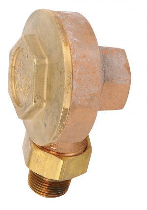 Rusty brass water pressure regulator valve with threaded fittings.