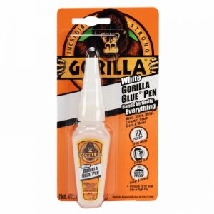 Packaging of a White Gorilla Glue Pen on an orange background.