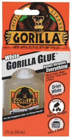 Package of white Gorilla Glue featuring a gorilla face and strong adhesive claims.