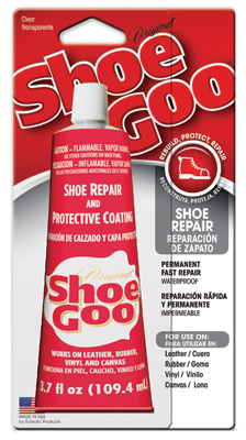 A tube of Shoe Goo shoe repair and protective coating on a red retail card.