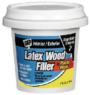 Container of DAP latex wood filler for interior/exterior use with a white lid.