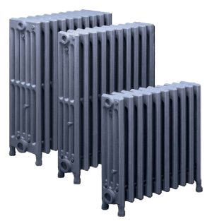 Three cast iron radiators isolated on a white background.