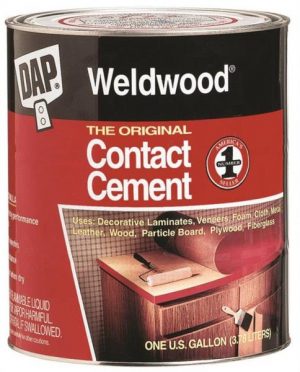 A can of Weldwood contact cement with product details and uses listed on the label.