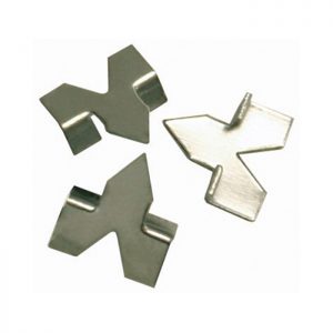 Two metal puzzle pieces on a white background.