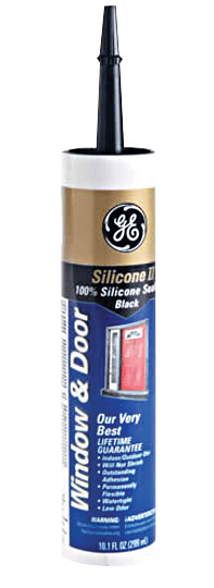 Tube of black silicone sealant for windows and doors.