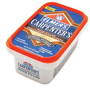 Container of Elmer's Carpenter's Wood Filler with blue and orange labeling.