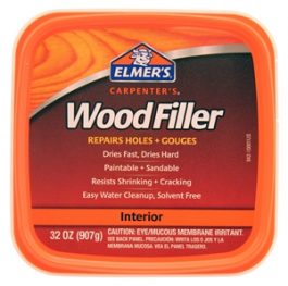 Container of Elmer's Carpenter's Wood Filler for interior repairs, 32 oz size.