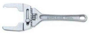 An adjustable crescent wrench isolated on a white background.