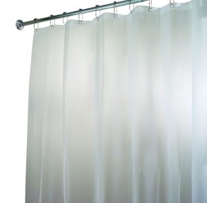 White shower curtain hanging on a metal rod with rings against a white background.