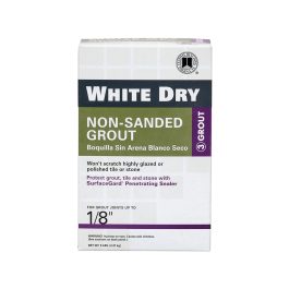 A box of white dry non-sanded grout for tile joints up to 1/8 inch.