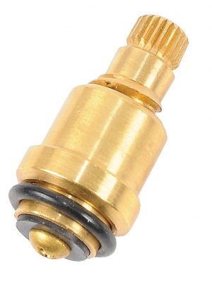 Close-up of a golden brass cartridge for a faucet on a white background.