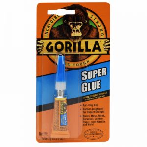 Packaging of Gorilla Super Glue with a logo of a gorilla's face, highlighting toughness and strength.
