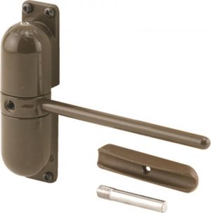 Brown manual door closer with a parallel arm assembly and adjustment screw.