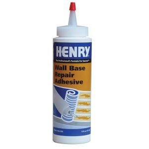 A bottle of HENRY Wall Base Repair Adhesive against a white background.