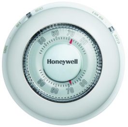 Round Honeywell thermostat with temperature control dial.