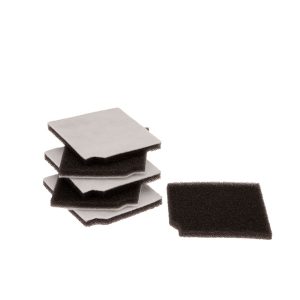 A stack of grey foam sponges with one sponge detached on a white background.