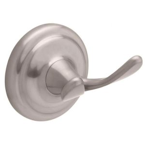 A satin nickel door lever on a round backplate.
