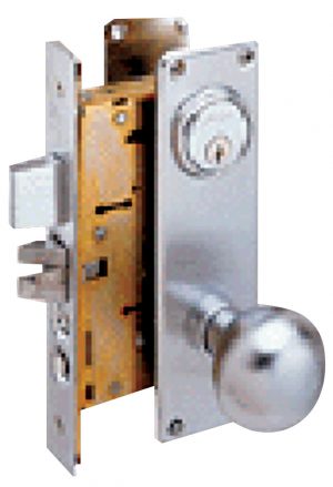 An exposed mechanical door lock with a silver knob on a white background.