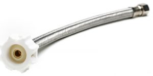 Flexible metal hose with a white plastic connector on one end against a white background.