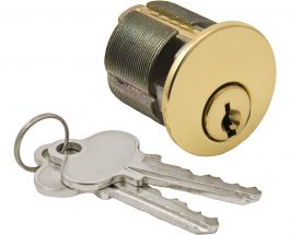 A cylindrical lock with keys on a white background.