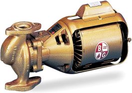 Industrial bronze water pump with motor on white background.