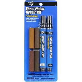 Packaging of a wood finish repair kit with markers and filler sticks.