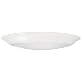 Flush mount white ceiling light fixture on a plain background.