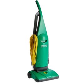 Green upright Bissel vacuum cleaner with yellow cord on white background.