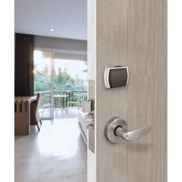 Open door to a balcony with a view of palm trees, showcasing a modern door handle and electronic lock.