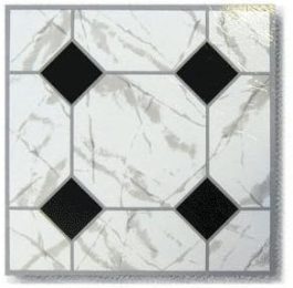 Sample of white marble tile with black hexagonal accents and textured surface.