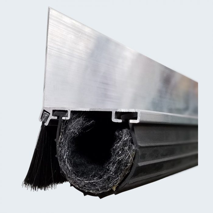 Cross-section of an aluminum profile with brush seal and insulation material.