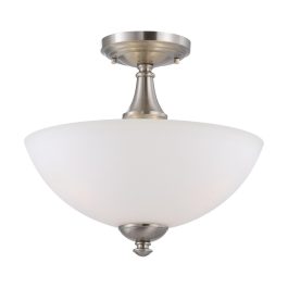 Semi-flush mount ceiling light with a white glass shade and nickel finish.