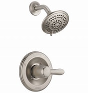 Modern stainless steel showerhead and faucet on a white background.