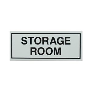 A sign with the text "STORAGE ROOM" in bold letters on a gray background with a black frame.