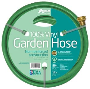 Green 50ft garden hose coiled on a spool with product information labels.