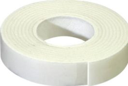 A roll of white adhesive tape on a white background.