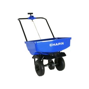 Blue push spreader with two wheels and adjustable handle.