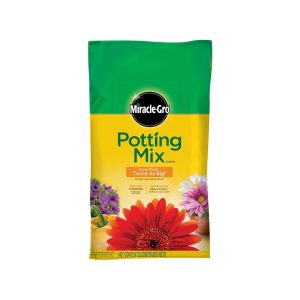 A package of Miracle-Gro Potting Mix with flowers on the front.