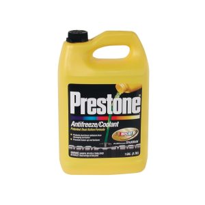A yellow jug of Prestone antifreeze/coolant with product labels and warnings.