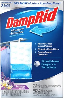 Package of DampRid moisture absorber with lavender vanilla scent hanging in a room.